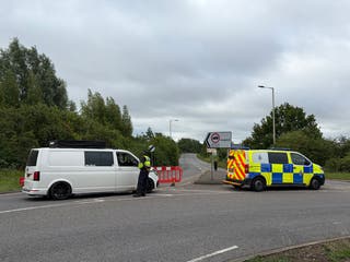 A Police road block on Ampthill Road, Bedford South on Saturday, after two East Midlands Railway (EMR) trains were involved in a collision around 5.15pm on Friday
